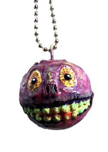 Skull Face Peel Custom Pendant figure by Aeqea, produced by Kidrobot. Front view.