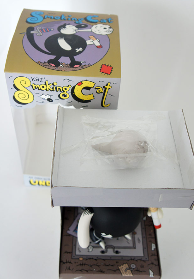 Smoking Cat figure by Kaz, produced by Critterbox. Packaging.