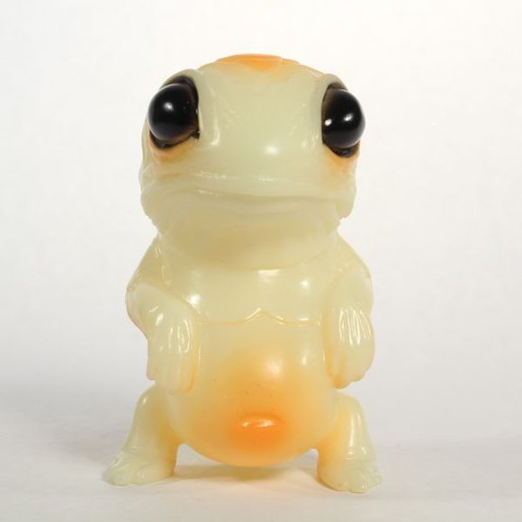 Snybora - SDCC GID Orange figure by Chris Ryniak, produced by Squibbles Ink + Rotofugi. Front view.