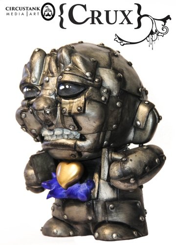 The Gilded Heart figure by Crux, produced by Kidrobot. Front view.