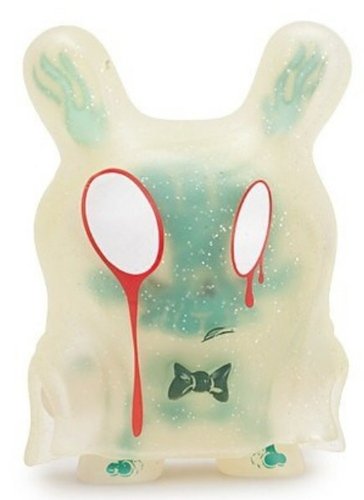 The Grisly Phantom GID figure by Brandt Peters, produced by Kidrobot. Front view.