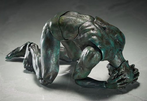 The Thinker figure, produced by Freeing. Side view.