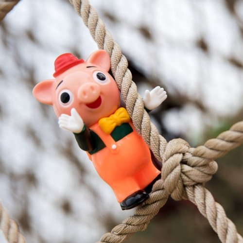 Three Little Pigs (Carnival Edition Orange) figure by Pointless Island, produced by Awesome Toy. Front view.