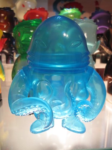 Squirm Unpainted Clear Blue figure by Brian Flynn, produced by Super7. Front view.