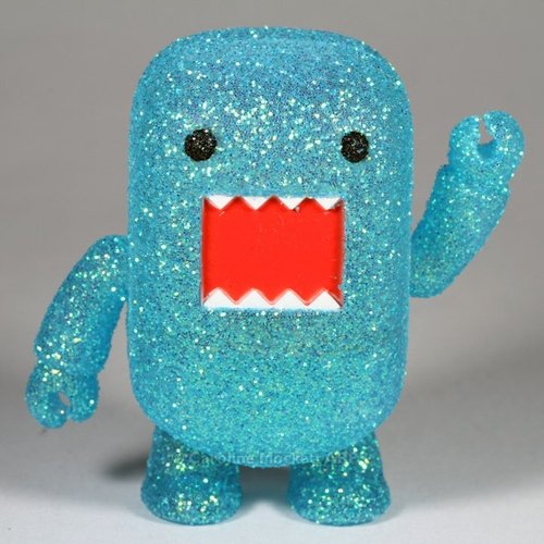 Light Blue Glitter Domo Qee figure by Dark Horse Comics, produced by Toy2R. Front view.