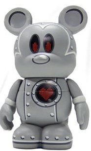 Tin Mouse figure by April Kelly, produced by Disney. Front view.