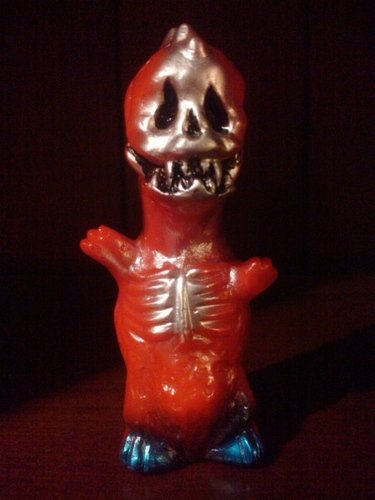Red Honegon figure by Elegab, produced by Elegab. Front view.