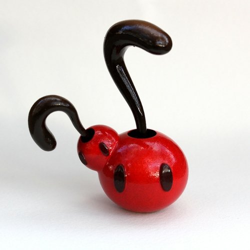 Siamese Cherries figure by Lou Pimentel. Front view.