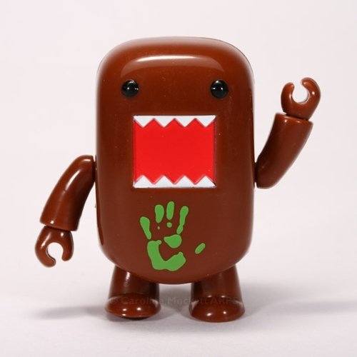 Brown GID Hand Domo Qee figure by Dark Horse Comics, produced by Toy2R. Front view.