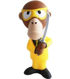 The Yellow Triangle Monkey Crazy 88 figure by Vinnie Fiorello, produced by Funko. Front view.