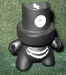 Fatcap  Prototype figure by Mtn, produced by Kidrobot. Front view.