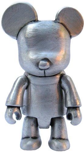 Metal Qee - Silver figure, produced by Fully Visual. Front view.