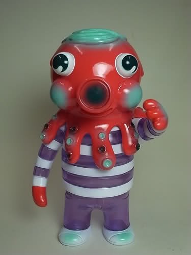 New Year Globby - Red & Clear Purple figure by Bwana Spoons, produced by Gargamel. Front view.