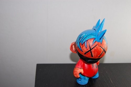 osty figure by Tooobe, produced by Kidrobot. Front view.