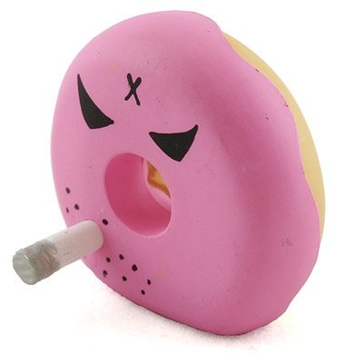 Karl - Pink figure by Frank Kozik, produced by Kidrobot. Front view.
