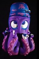8 Hands for Bad Octopus Purple figure by Vinnie Fiorello, produced by Wunderland War . Front view.