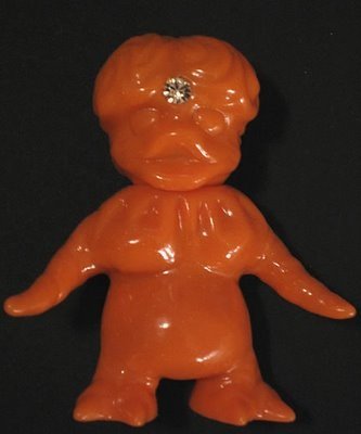 Nougaki - Unpainted Orange Rotofugi Exclusive figure by Naoki Koiwa, produced by Cronic. Front view.