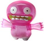 Pink Chupacabra figure by David Horvath, produced by Wonderwall. Front view.