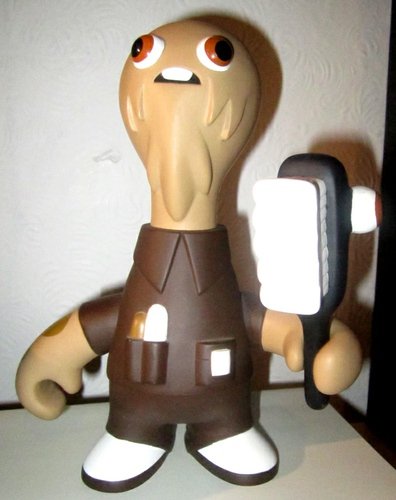 Big Janitor (Brown Version) figure by Pete Fowler, produced by Playbeast. Front view.