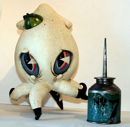 No. 7 Ivory Squid and Ink Can figure by Brandt Peters. Front view.