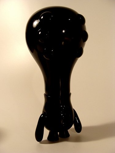 Black Polito - OOPART (Out of Place Art Object) figure by Rolito. Front view.