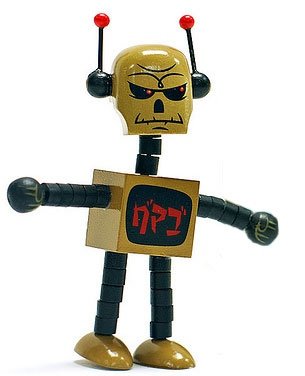 Deathbot - SDCC Gama-Gold figure by Tim Biskup, produced by Ningyoushi. Front view.
