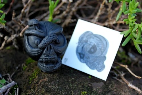 Skull Tattoos - Serpent Skull - Black figure by Double Haunt. Front view.