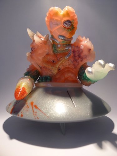 Death Climax Biological K.I. Grey Disc (blood splash) figure, produced by Toygraph. Front view.