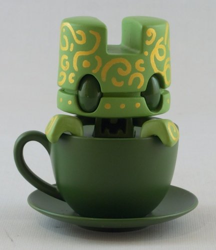 Green and Gold Doodle Tea figure by Matt Jones (Lunartik), produced by Lunartik Ltd. Front view.