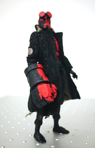 Hellboy figure by Mike Mignola. Front view.