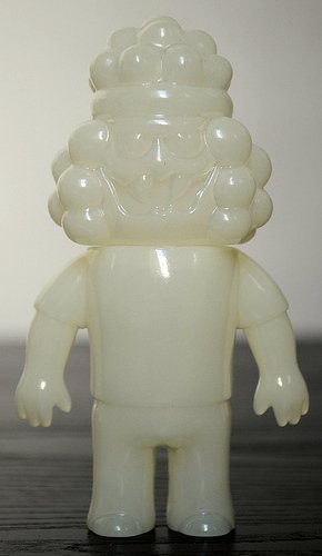 Hollis Price Neon Laser Eyes Unpainted GID figure by Le Merde, produced by Super7. Front view.