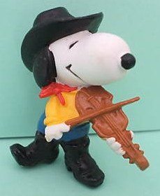 Snoopy cowboy with violin figure by Charles M. Schulz. Front view.