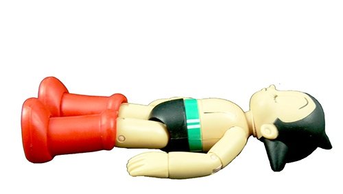 Sleeping Astro Boy (Color version) figure, produced by Medicomtoy. Front view.