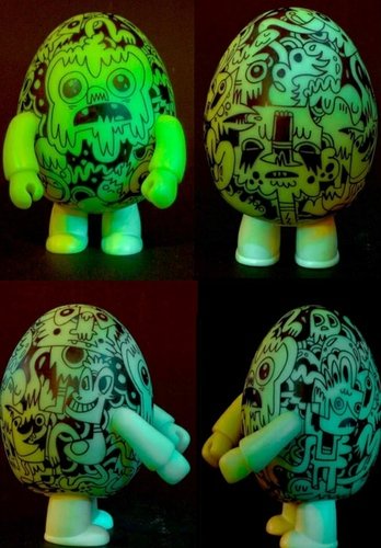 Greeny Egg - custom glow in dark Qee figure by Jon Burgerman. Front view.