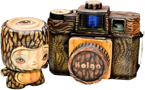 Woodie-Cam figure by 64 Colors, produced by Marshall. Front view.
