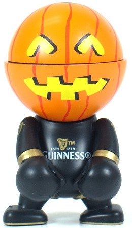 Halloween Pumpkinhead Guinness figure, produced by Play Imaginative. Front view.