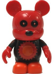 Red Gear Bear figure by Maria Clapsis, produced by Disney. Front view.