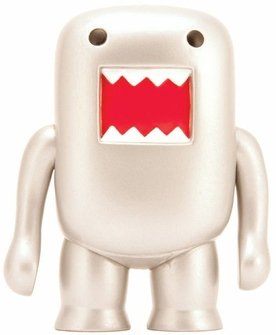 Domo Metallic - Silver figure, produced by Dark Horse. Front view.