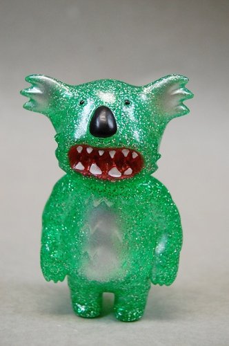Kowaiila - Clear Green Glitter figure by Shane Haddy, produced by Hints And Spices. Front view.