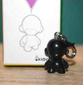 Mini Munny Keychain figure by Tristan Eaton, produced by Kidrobot. Front view.