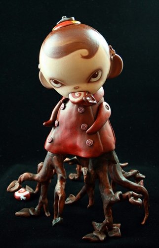 Candy-roots Girl figure by Kathie Olivas, produced by Kidrobot. Front view.