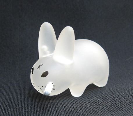 Mini Smorkin Labbit - Clear figure by Frank Kozik, produced by Kidrobot. Front view.