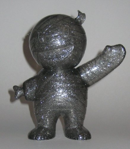 Mummy Boy - Unpainted Glitter Smoke Lucky Bag 10 Edition figure by Brian Flynn, produced by Super7. Front view.