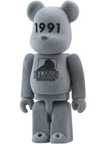 X-LARGE Be@rbrick 100% figure by X-Large, produced by Medicom Toy. Front view.