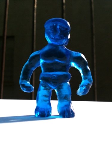 Blue Harvest Man-Nie Dark figure by Peter Kato. Front view.