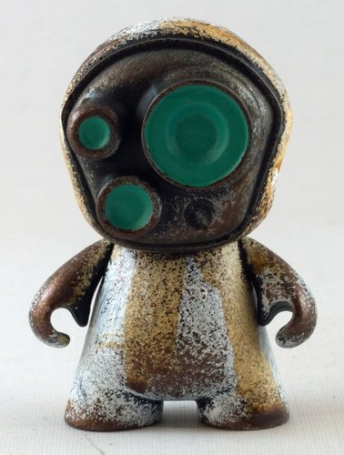 Micro Munny Sprog figure by Cris Rose, produced by Kidrobot. Front view.