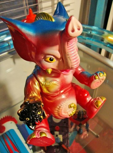 Red Boss Carrion figure by Paul Kaiju, produced by Medicom Toy. Front view.