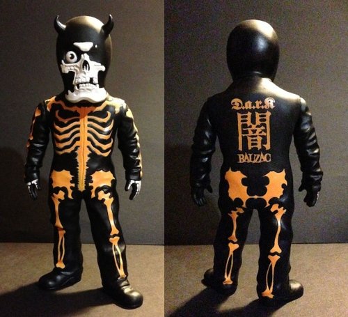 D.a.r.k Skullman (orange) figure by Balzac, produced by Evilegend 13. Front view.
