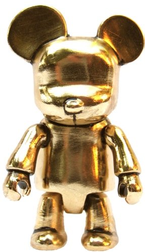 Metal Qee - Gold figure, produced by Fully Visual. Front view.