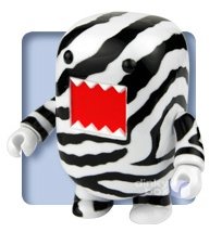 Zebra Stripes Domo Qee figure by Dark Horse Comics, produced by Toy2R. Front view.